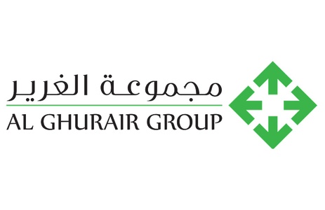 The image features the logo of Al Ghurair Group, showcasing a distinctive green arrow design.