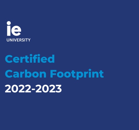 Certification of certified carbon footprint for IE University for the academic year 2022-2023, set against a deep blue background.