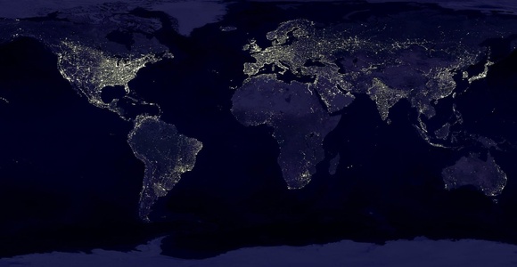A satellite image showing the night lights of Earth's continents from space.