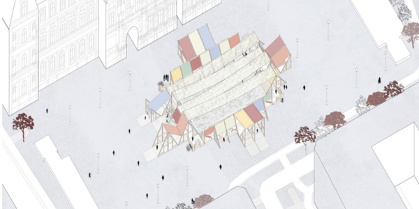 An aerial view of a market area with colorful tents surrounded by pathways and trees.