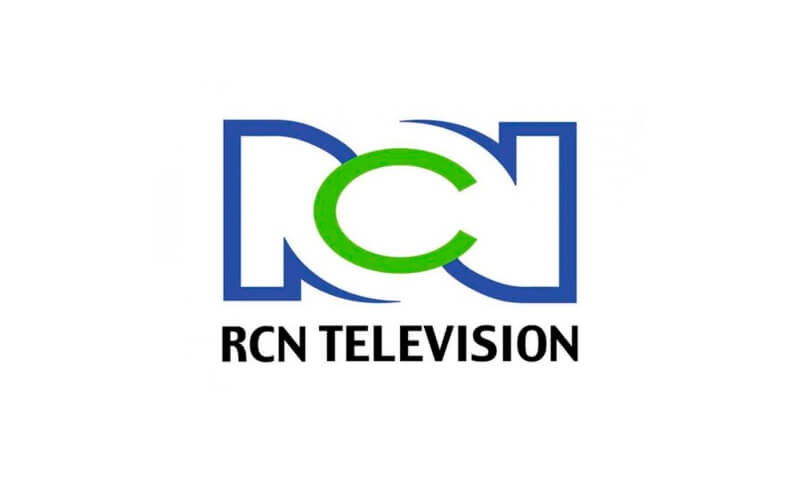 Logo of RCN Television featuring stylized letters 'RCN' in blue with a green circle.