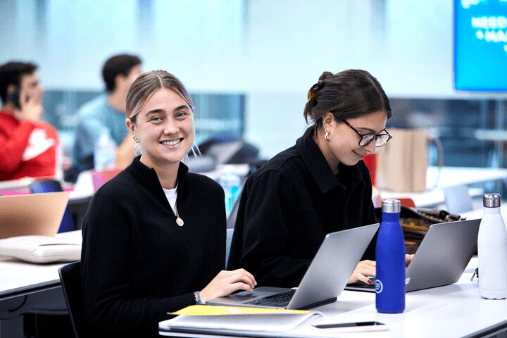 Two IE students during the Certificate in Data Science