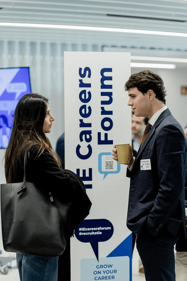 IE careers forum 2023: two student at the event
