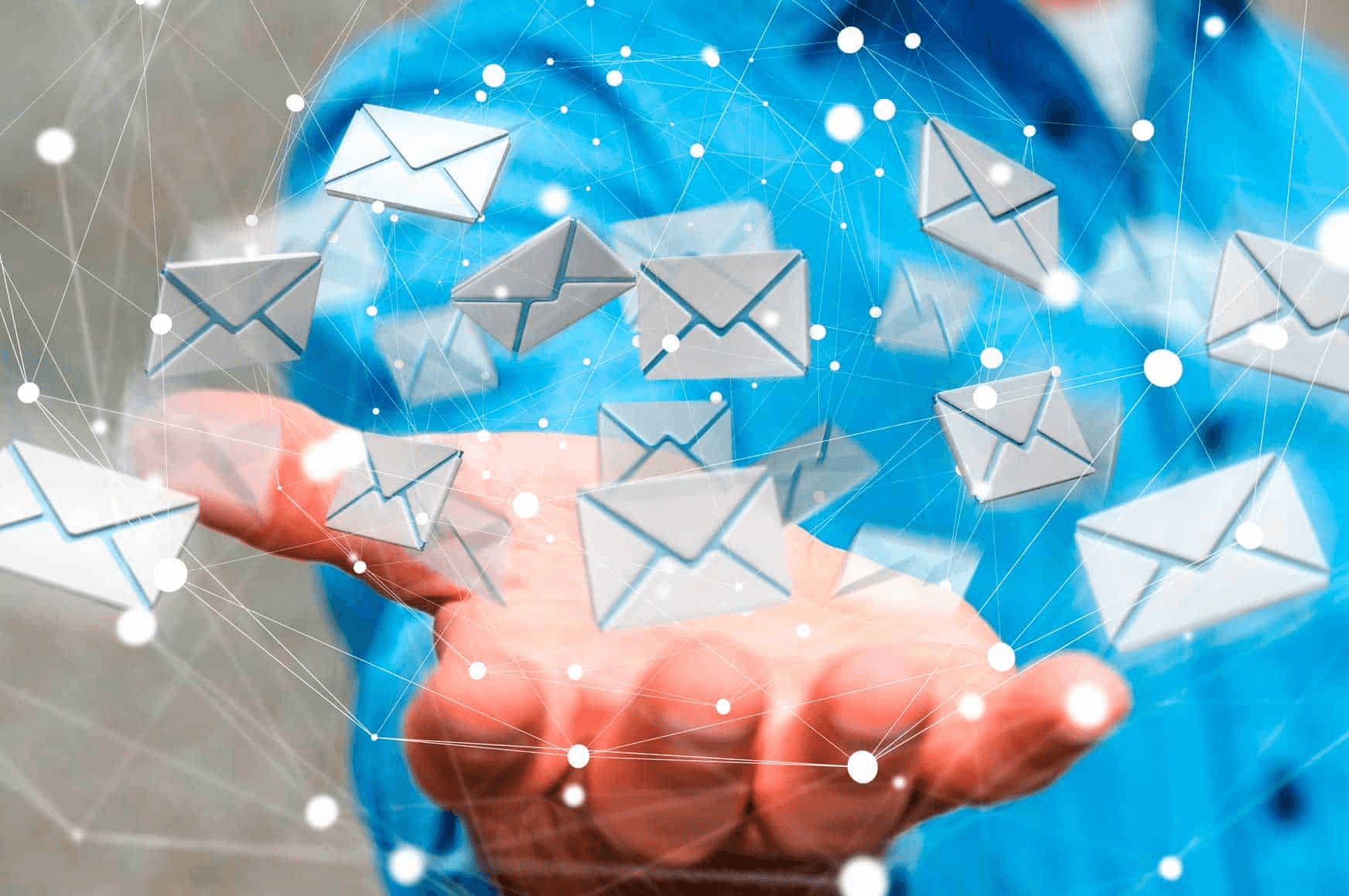 Ninjamail-header: abstract image with emails and hand holding them