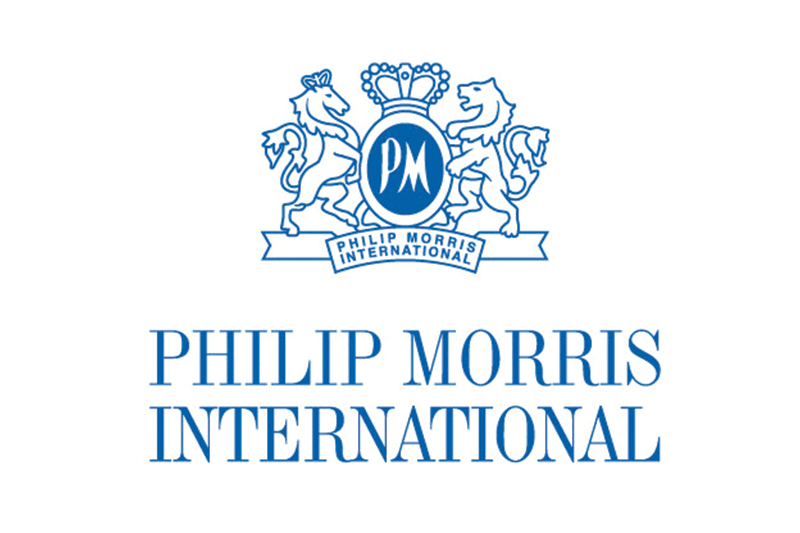 Logo of Philip Morris International featuring a blue emblem with lions and the text 'Philip Morris International'.